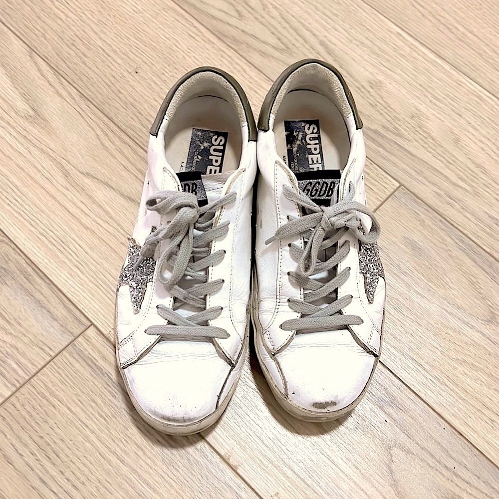 Golden Goose superstar white sneakers with olive, and glitter star